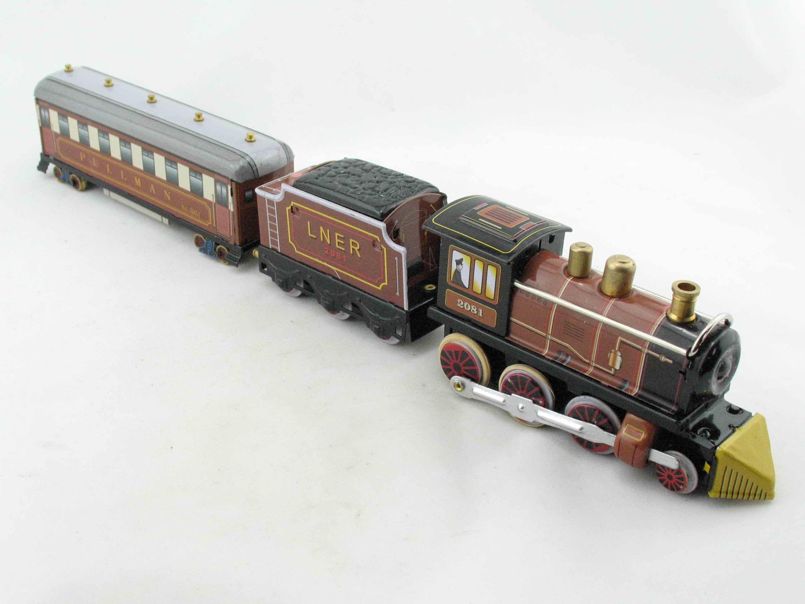 Blechspielzeug - Dampflok mit Tender und Personenwagen braun