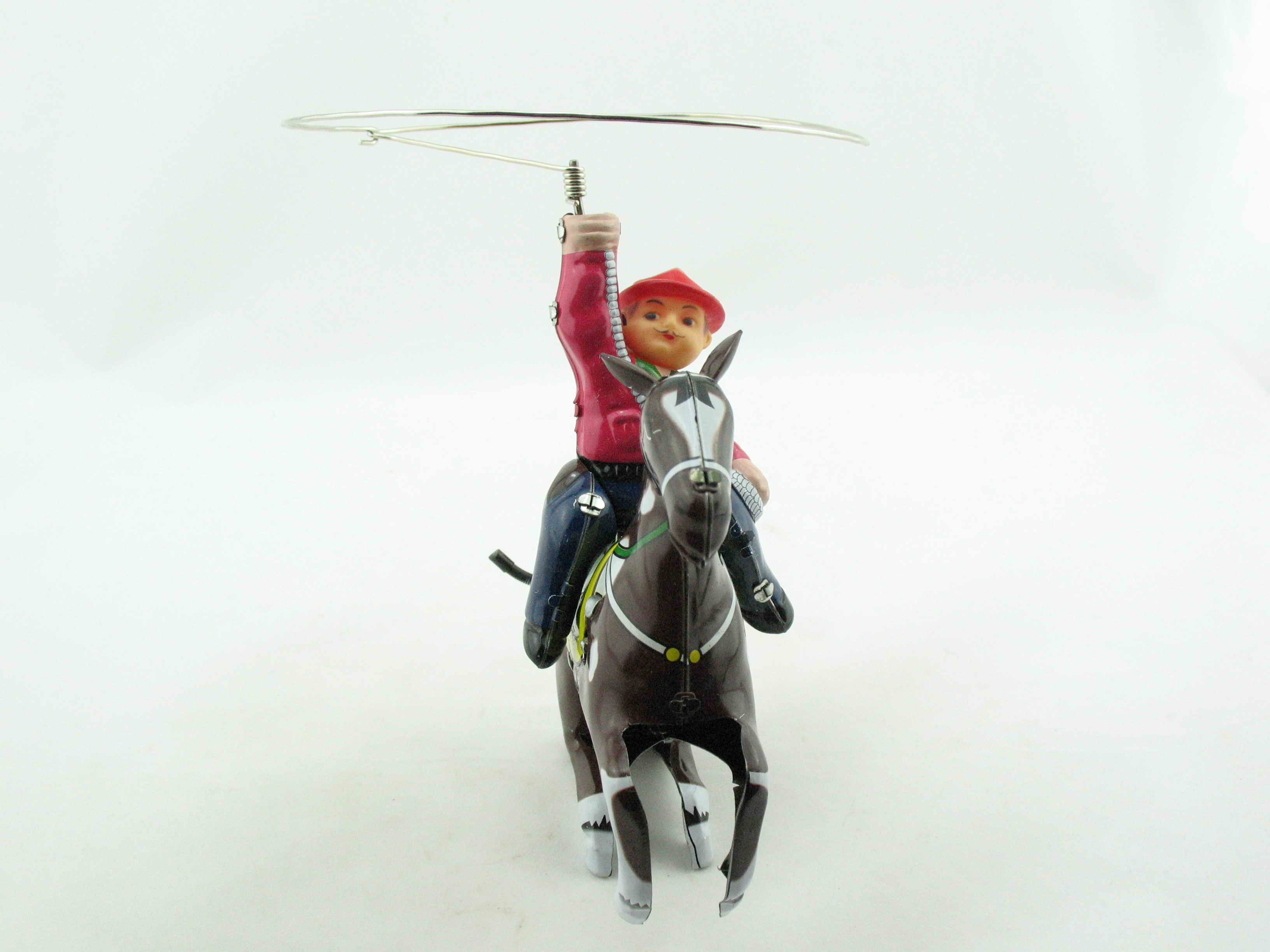 Blechspielzeug - Cowboy auf Pferd mit Lasso