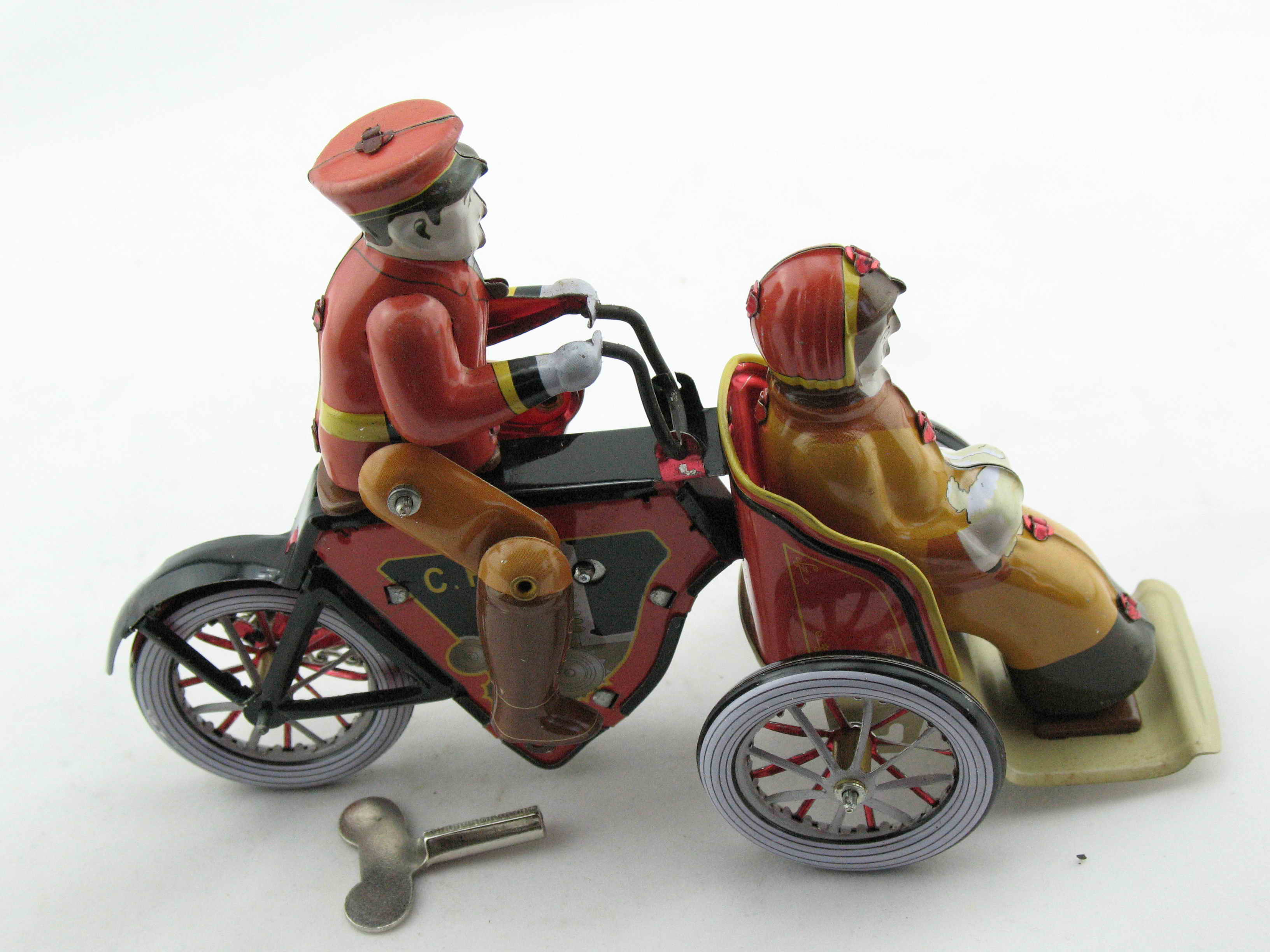 Blechspielzeug - Motorraddroschke, Mann und Frau