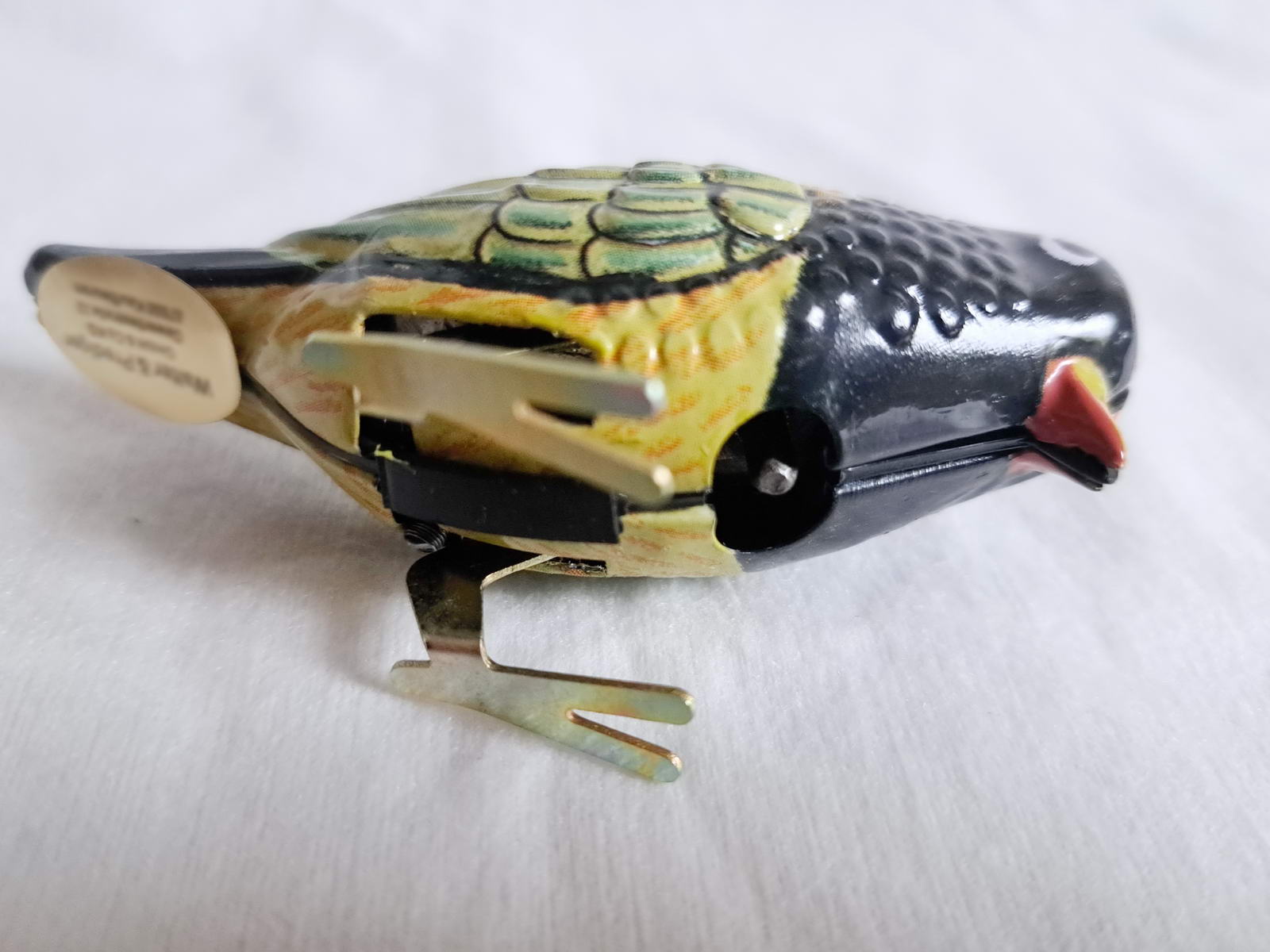 Blechspielzeug - Pickvogel zum Aufziehen, grün