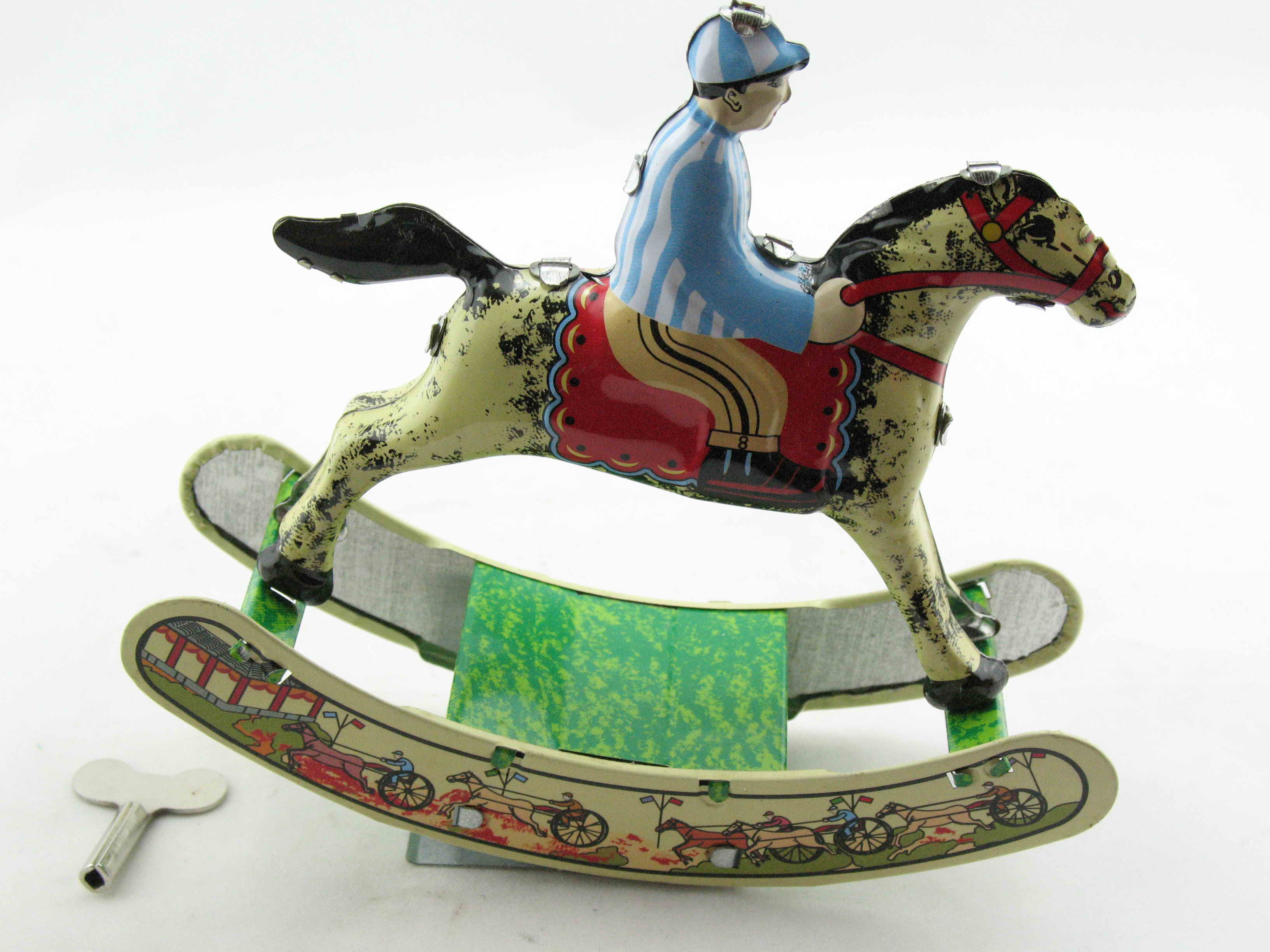 Blechspielzeug - Reiter auf Schaukelpferd, Rocking Horse