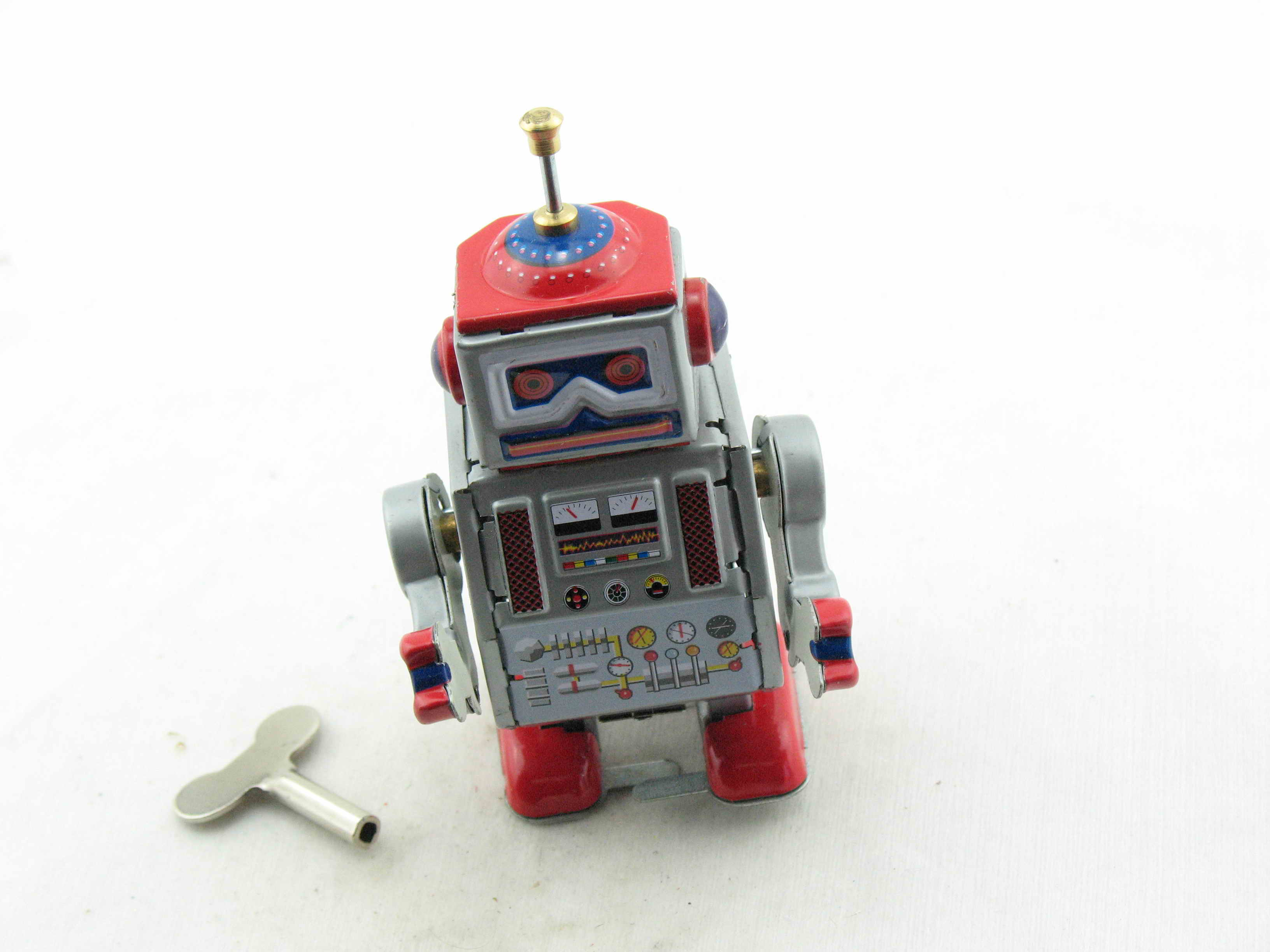 Blechspielzeug - Roboter, 10 cm silber/rot