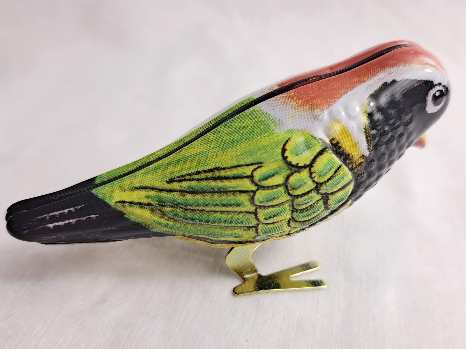 Blechspielzeug - Pickvogel zum Aufziehen, grün