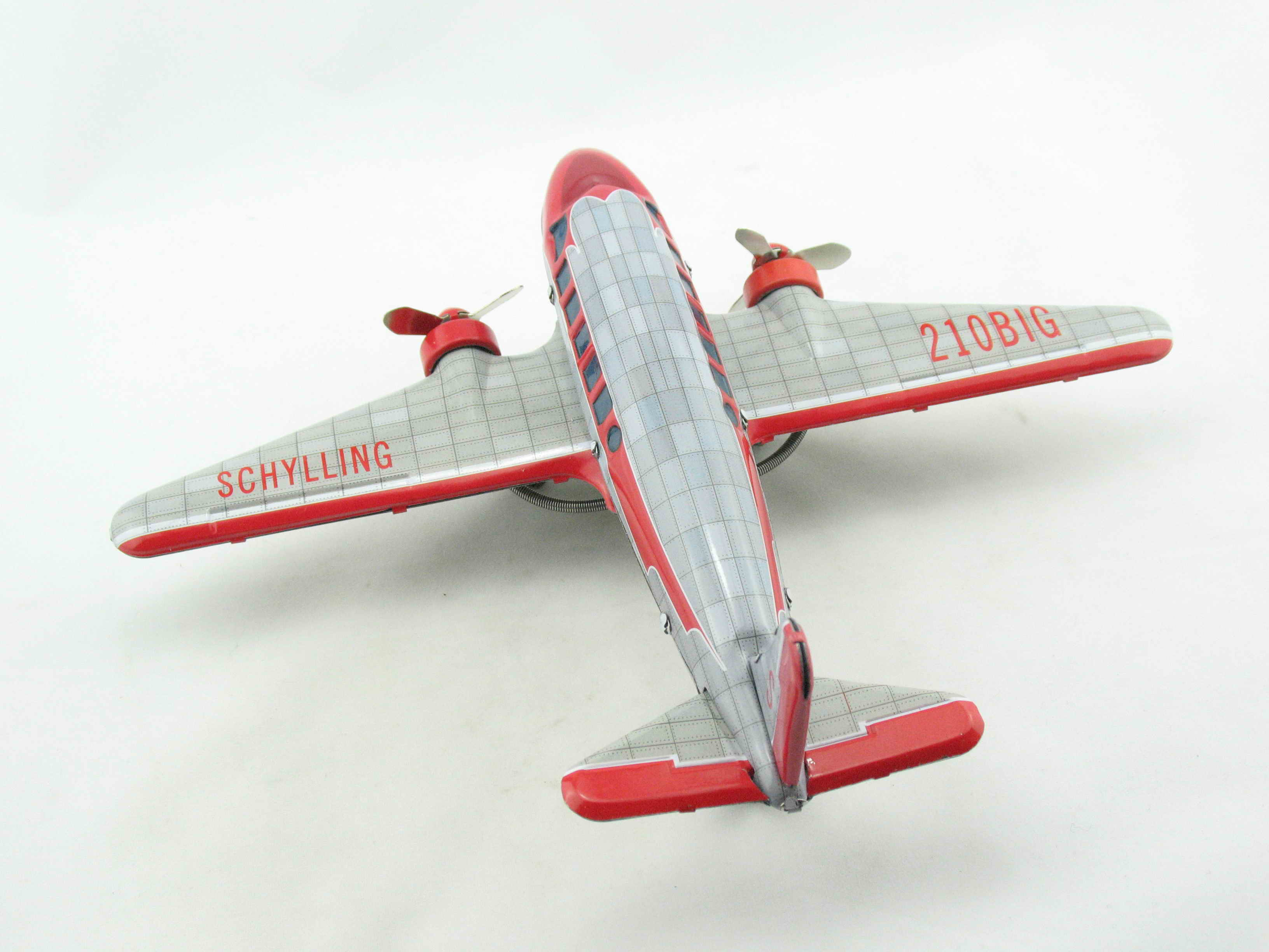 Blechspielzeug - Flugzeug DC3 mit Friktion silber/rot